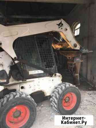 Аренда минипогрузчика Bobcat с навесным Москва