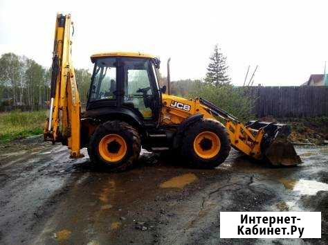Аренда экскаватора погрузчика с ямобуром Екатеринбург - изображение 1