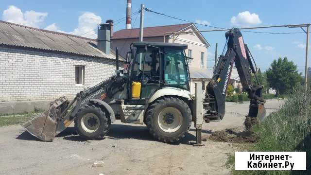Аренда экскаватора-погрузчика ковш 0,24 куба Волгоград - изображение 1