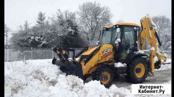 Уборка снега экскаватор погрузчиком JCB Орёл