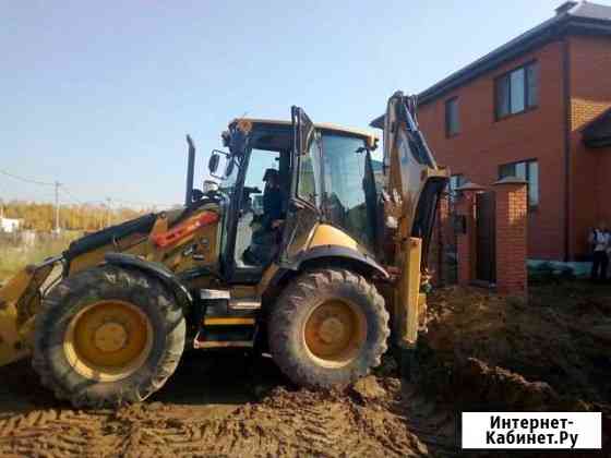 Услуги экскаватора-погрузчика CAT434F Балахна