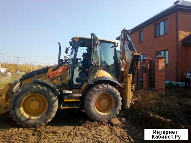 Услуги экскаватора-погрузчика CAT434F Балахна - изображение 1
