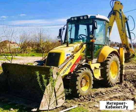 Услуги экскаватора-погрузчика Ростов-на-Дону