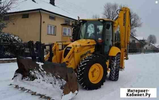 Уборка снега трактором Киров