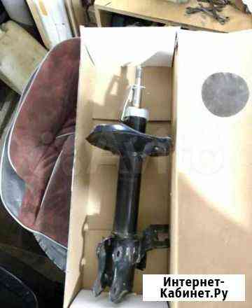 Nissan стойка новая передняя Кострома